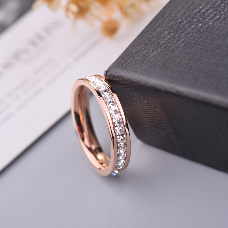 Minimal Titanium Rings For Women featuring rose gold finish and sparkling gemstones, perfect for everyday elegance.