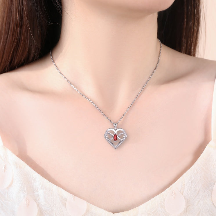 Infinity Butterfly Heart Necklace for Women on a model, showcasing its elegant design and sparkling detail.