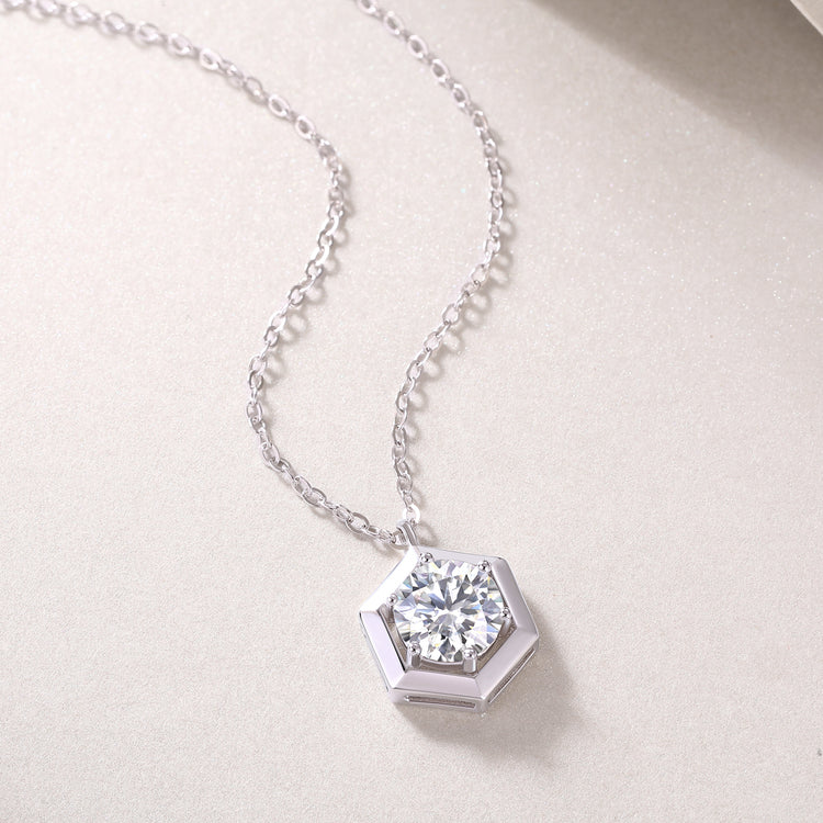 1 carat moissanite pendant necklace crafted in S925 sterling silver, featuring a hexagonal design and sparkling stone.