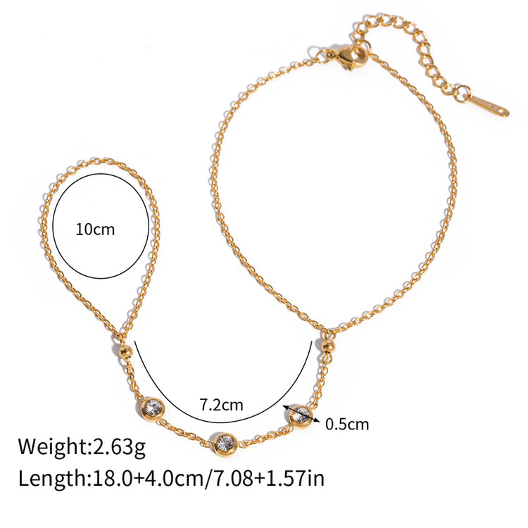 Gold hand chain bracelet dimensions and details, featuring a dainty design with beaded embellishments.