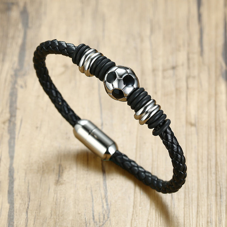 titanium steel football bracelet featuring a black braided design with a soccer ball centerpiece.