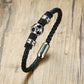 titanium steel football bracelet featuring a soccer ball design on a braided black band.