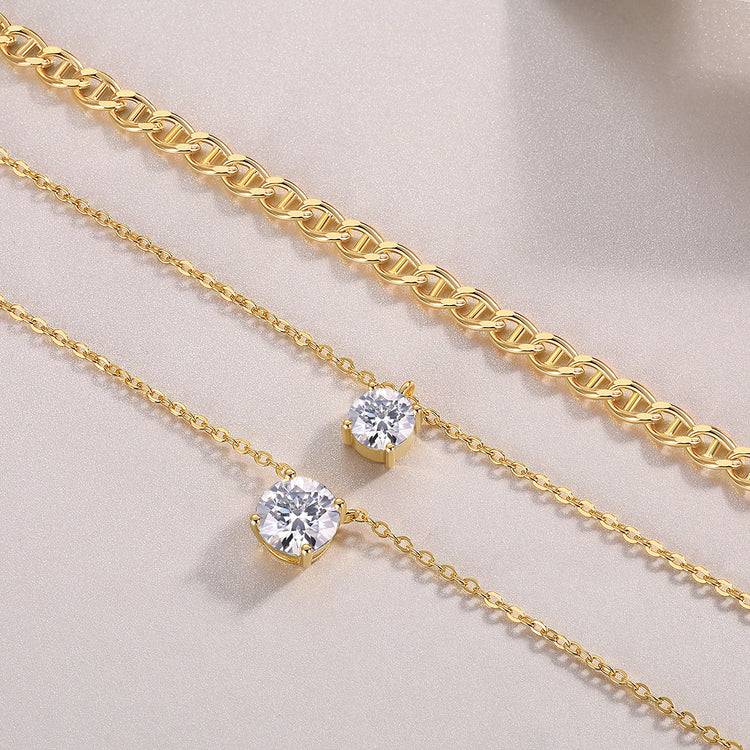 2-carat morganite pendant necklace displayed with gold chains on a neutral background, highlighting its minimalist design.