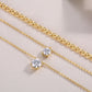 2-carat morganite pendant necklace displayed with gold chains on a neutral background, highlighting its minimalist design.