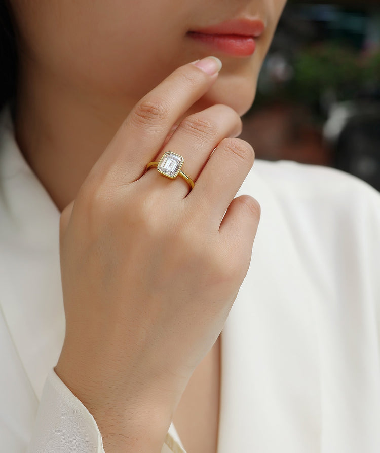 Luxury Moissanite Ring Set worn by a woman, showcasing the octagonal cut and S925 Sterling Silver gold plating.