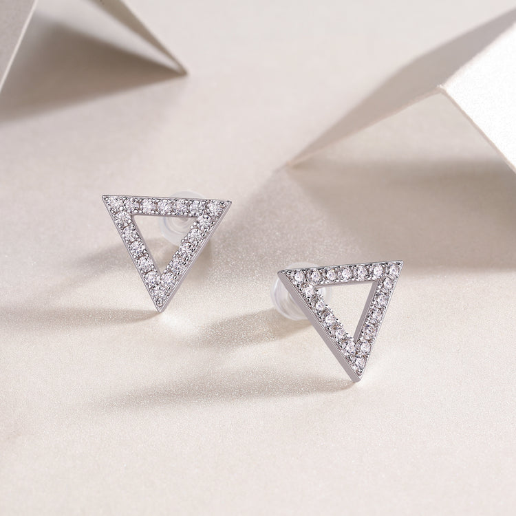 Moissanite earrings set featuring sparkly triangular sterling silver studs for elegant style.