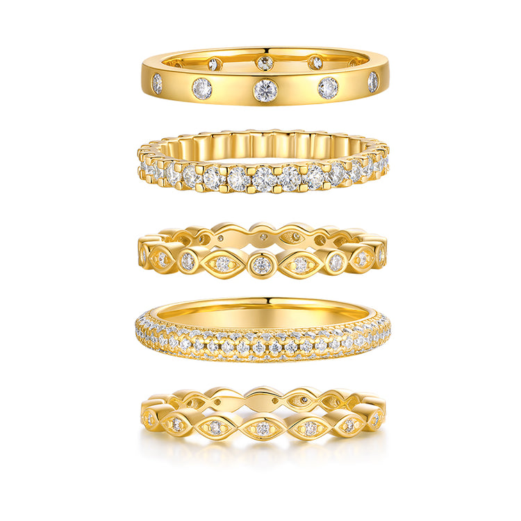 Moissanite wedding ring set featuring elegant gold-plated designs with sparkling stones for couples.