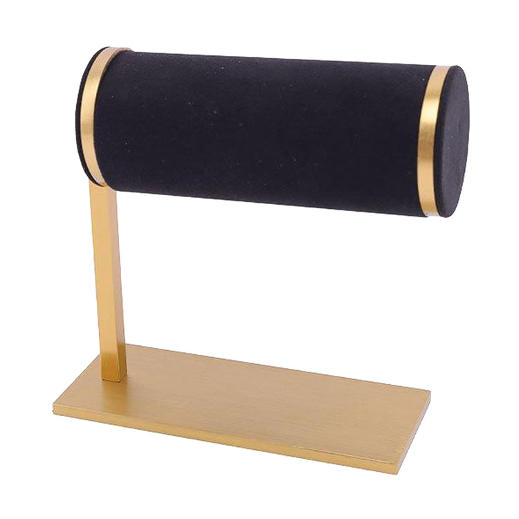 Jewelry watch display stand with a black velvet base and gold accents, perfect for showcasing watches.