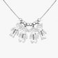 Custom doll diamond engraved personalized kids name necklace with names of children on pendants.