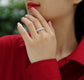 A model displaying the Luo Shen moissanite wedding ring set, featuring an elegant design in S925 silver.