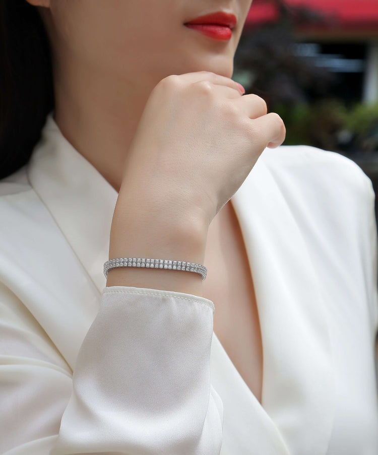 Light And Shadow Around The Wrist - Set With Top Quality Morganite On S925 Silver Electroplated Platinum Hand Chain Diamond Jewelry Bracelet Luxury Fashion Jewelry worn by a model.