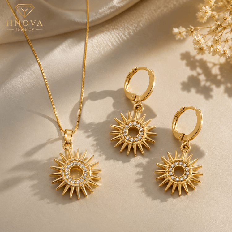 Sun Goddess™ Gold Jewelry Set featuring a sunburst pendant necklace and matching earrings in luxurious gold-tone finish.